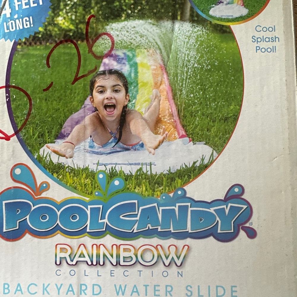 Rainbow Water Slide for Kids new in box. Box damaged item still in plastic